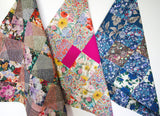 Bright Floral Liberty London Patchwork Kitchen Tea Towel in Hot Pink, Blue, Burgundy and Strawberry Thief close up
